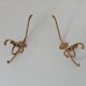 Old coat hook in solid golden brass