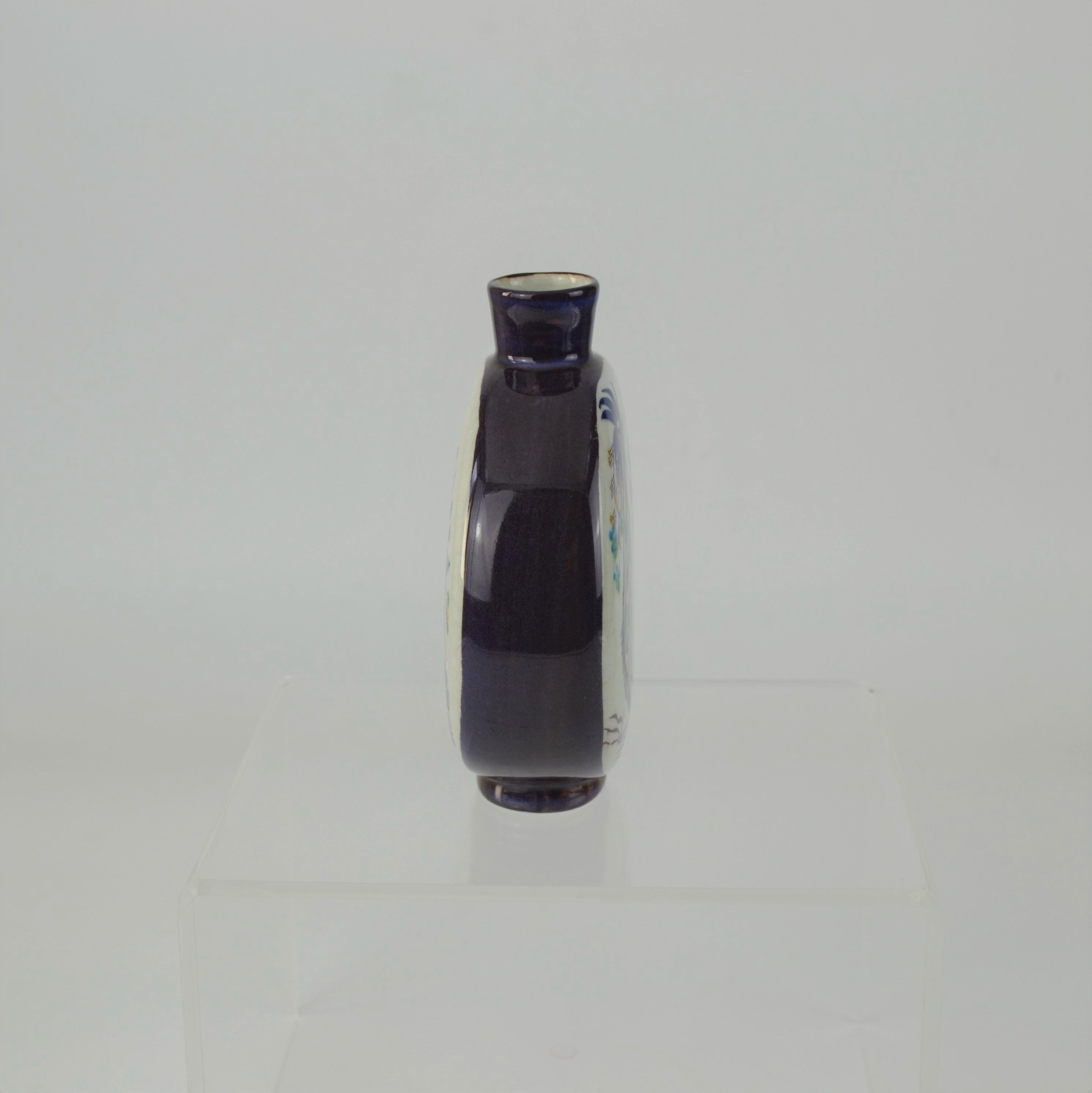 Earthenware bottle from Marianne Johnson's Tenera series for Aluminia