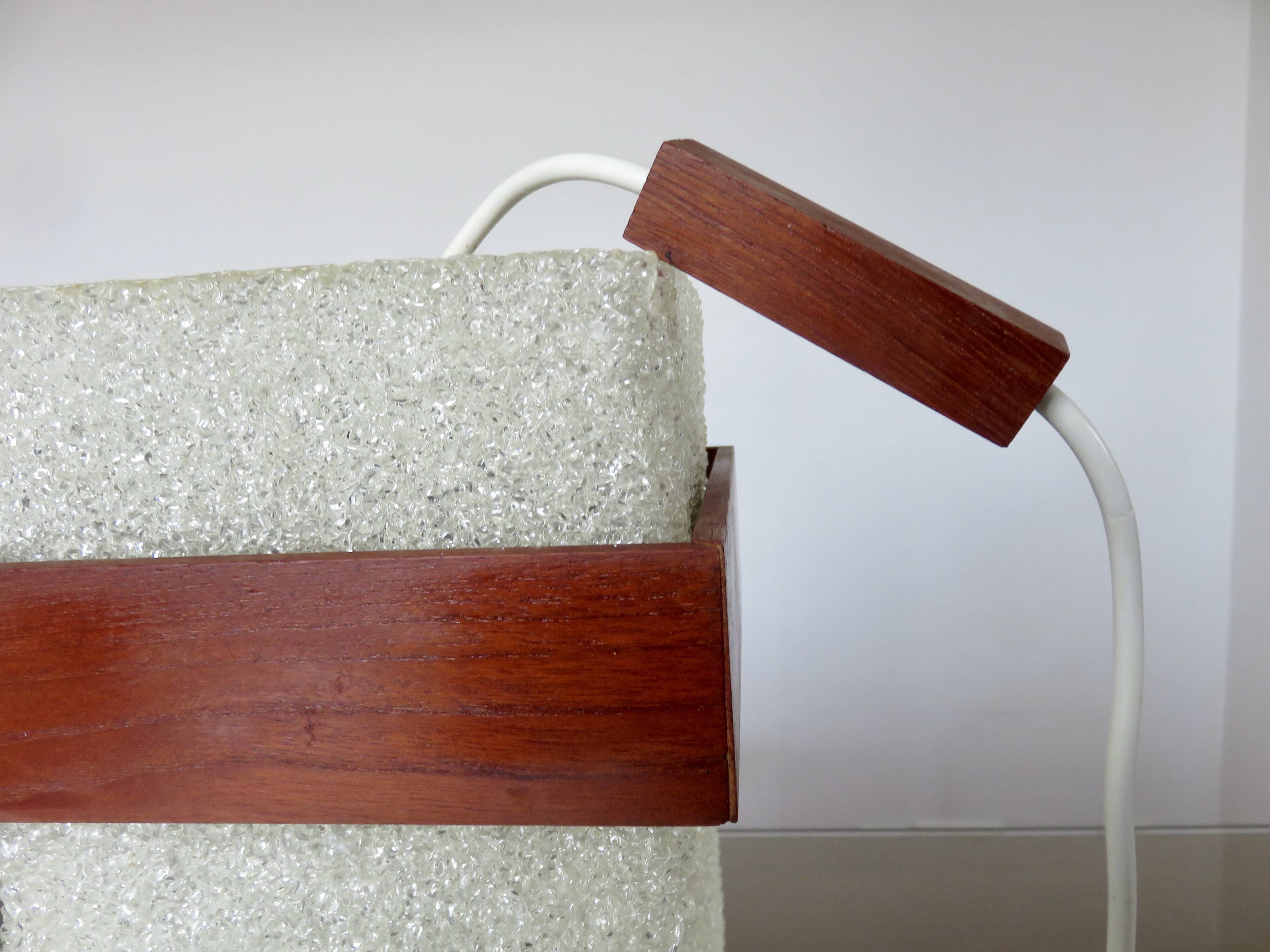 Pair of Scandinavian pendant lights in teak and perspex, 1970s.