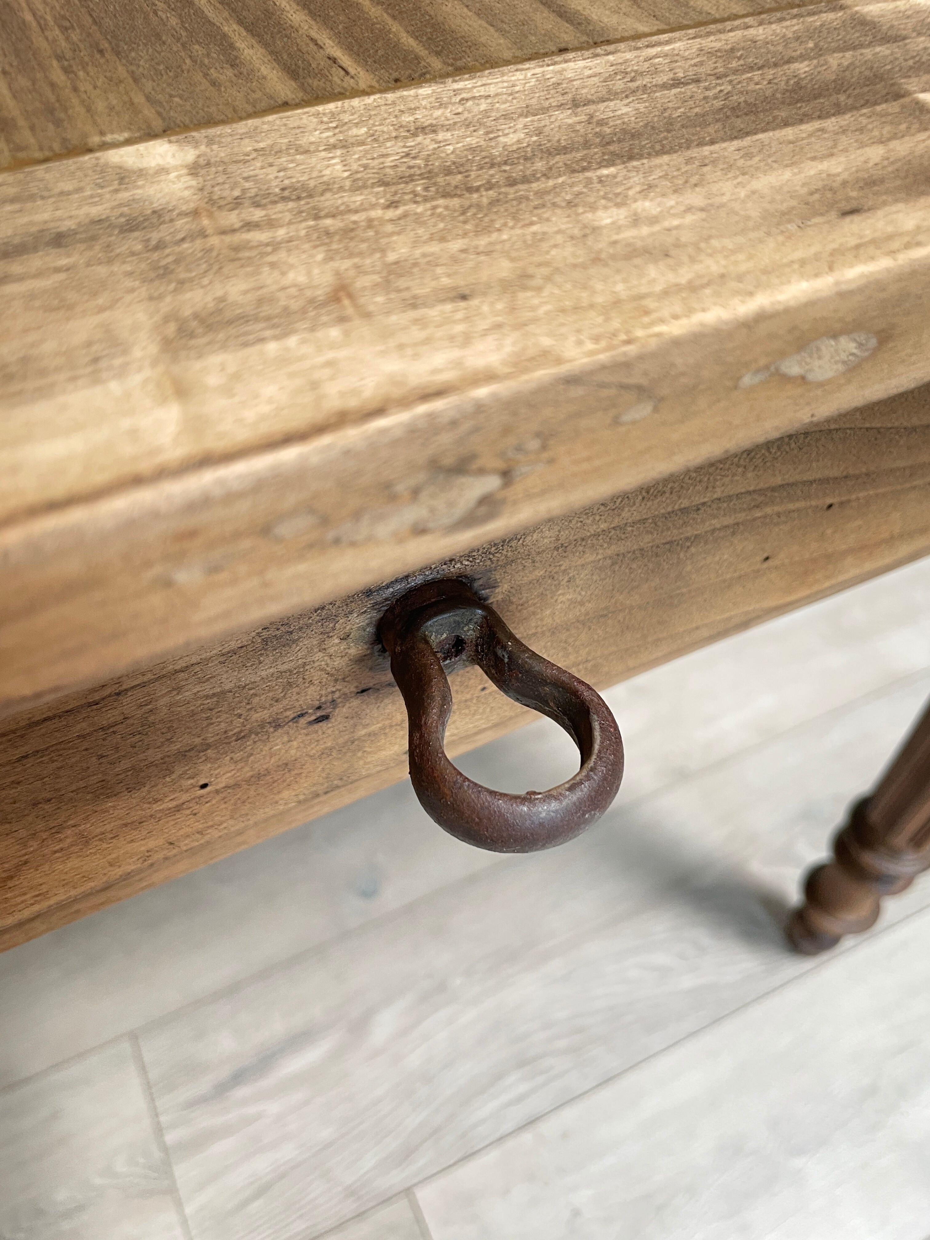 Vintage farmhouse table with turned legs.