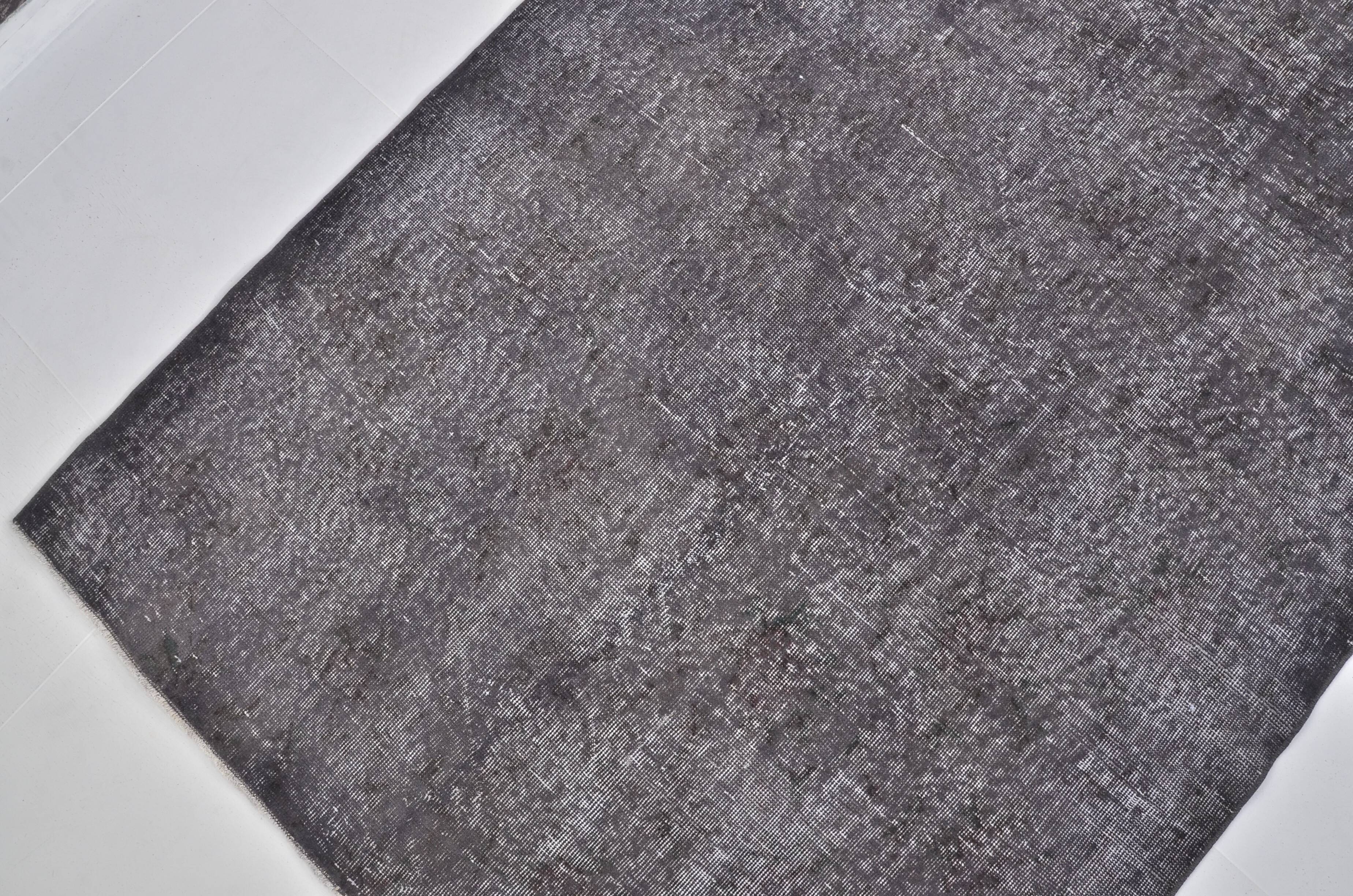 Tapis en laine grise