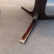 Extendable round table in Baumann style, black lacquered top, pedestal base.