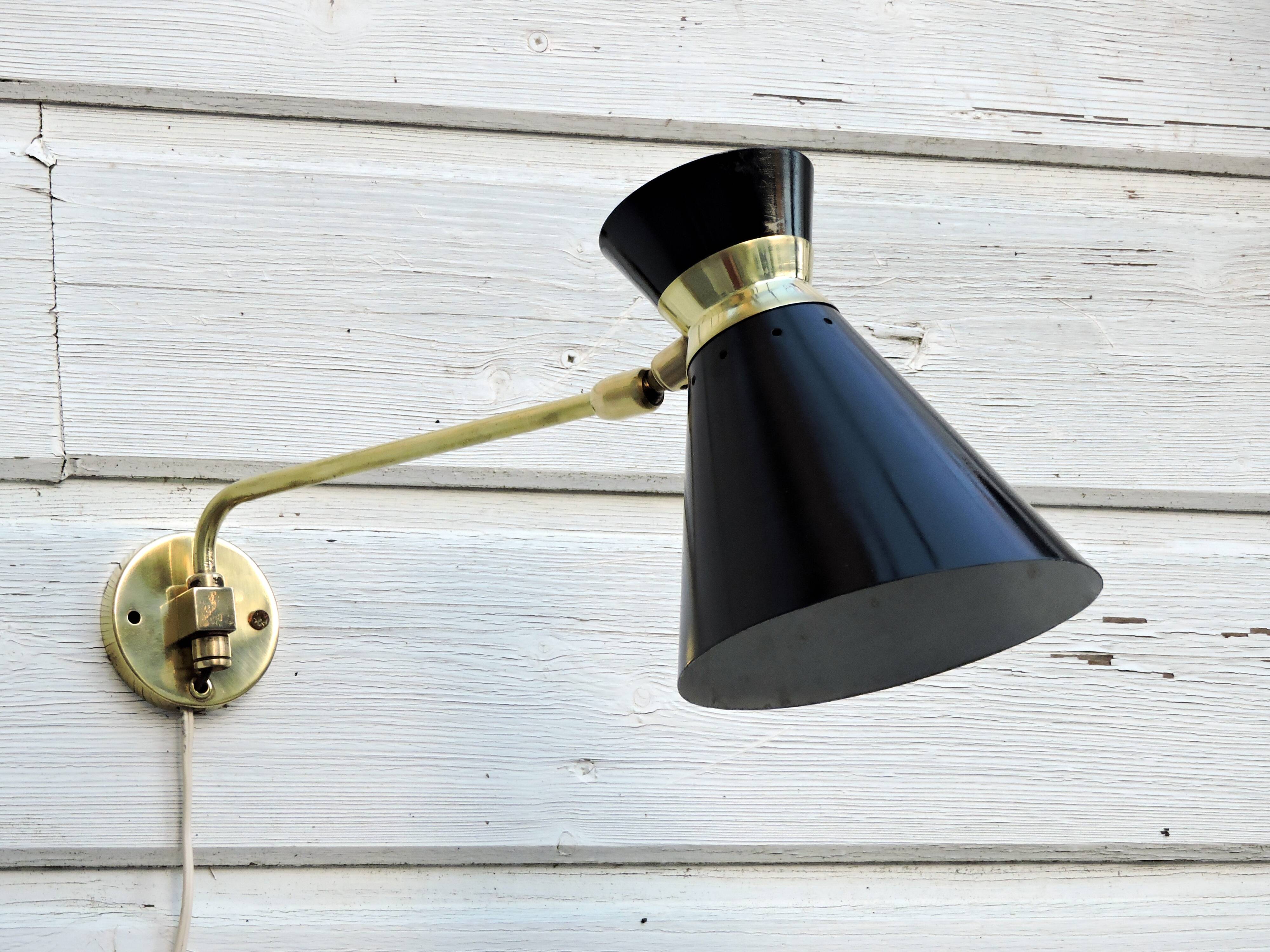 Adjustable stem wall lamp with ball head, diabolo lampshade