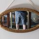 Miroir ovale Art déco en bois doré vers 1920
