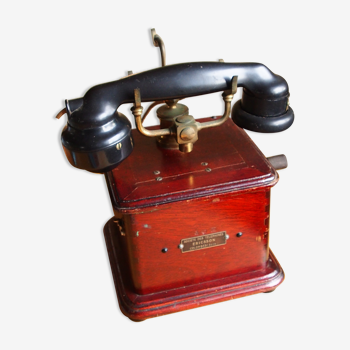 Téléphone ancien Ericsson en bois et bakélite