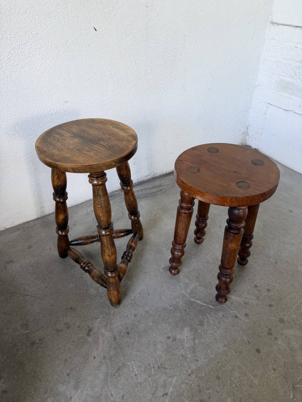 Pair of antique stools with turned legs.