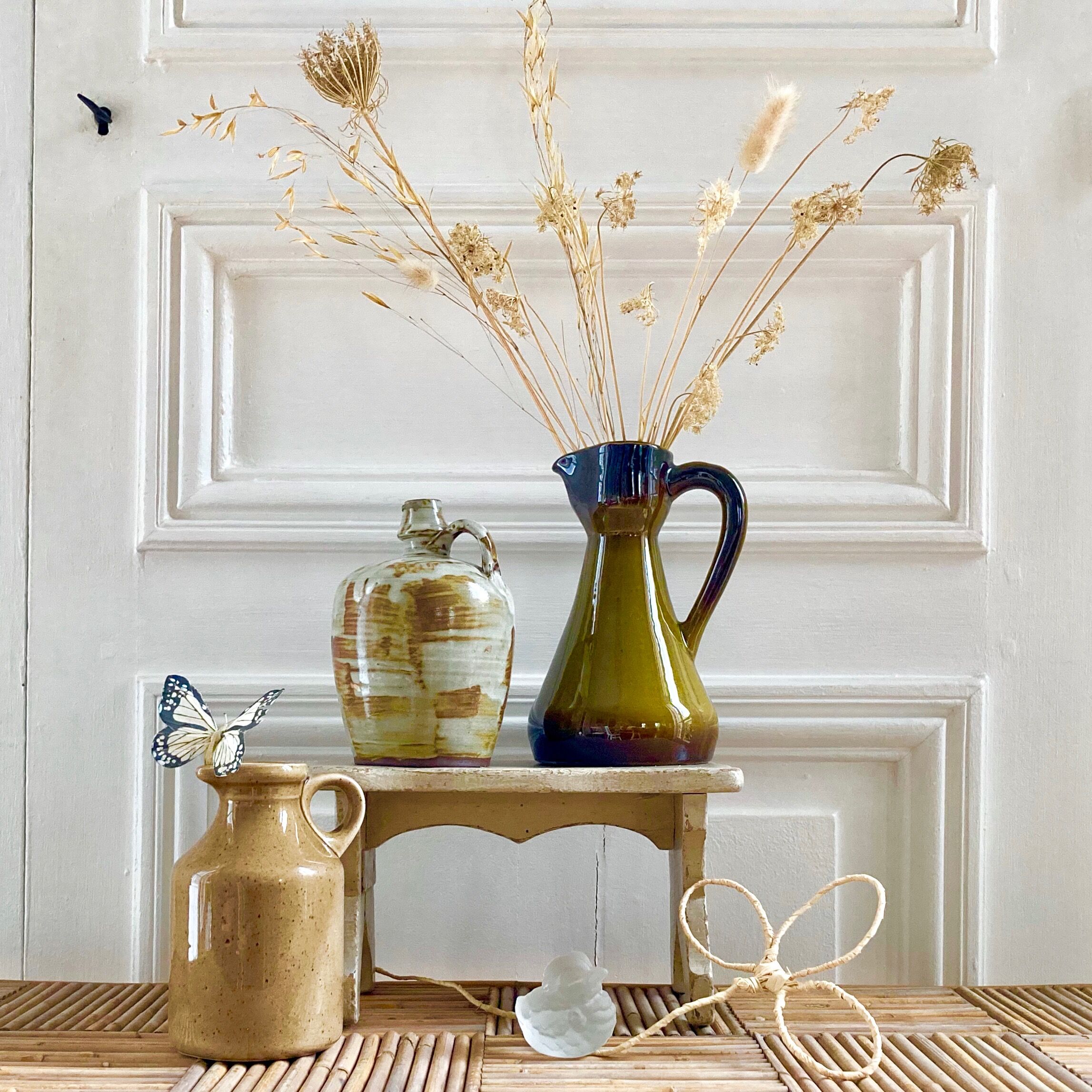 Set of three glazed ceramic pitchers