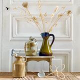 Set of three glazed ceramic pitchers