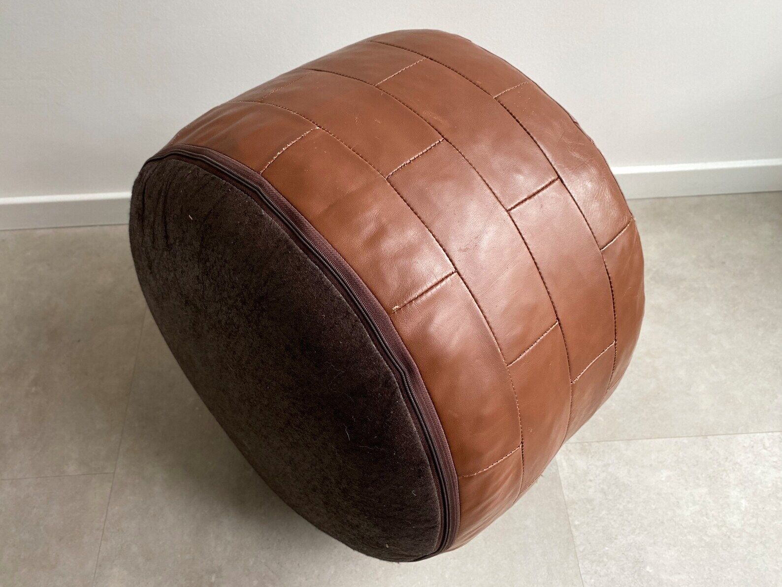 Vintage brown patchwork round leather ottoman / poof / bench