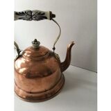 Old teapot in mixed copper and elements (handle and cap) in painted ceramic.
