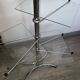 Four-tier rotating shelf in chrome metal