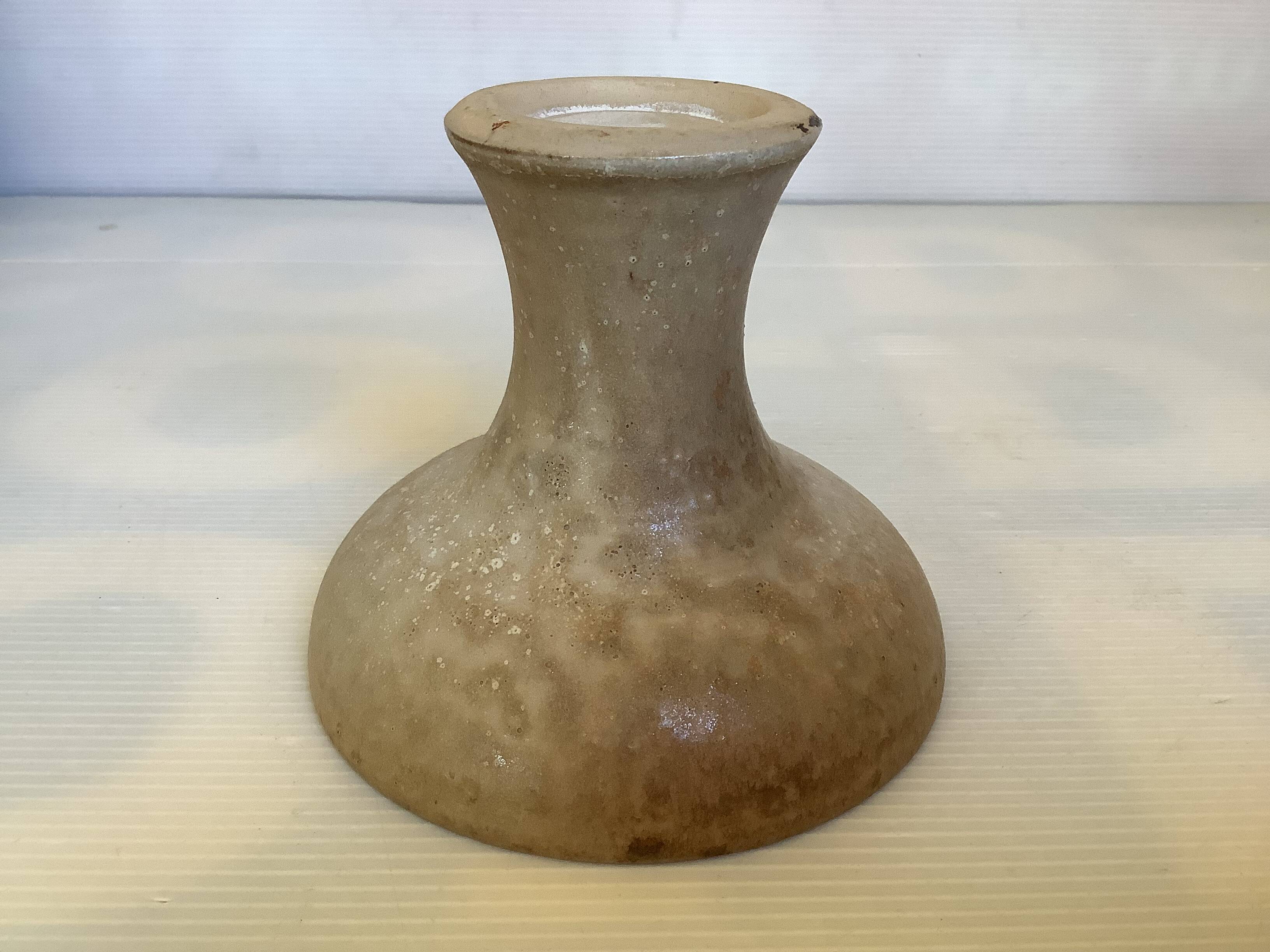Beige ceramic chalice-shaped candle holder