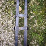 Wrought iron log holder or plant stand