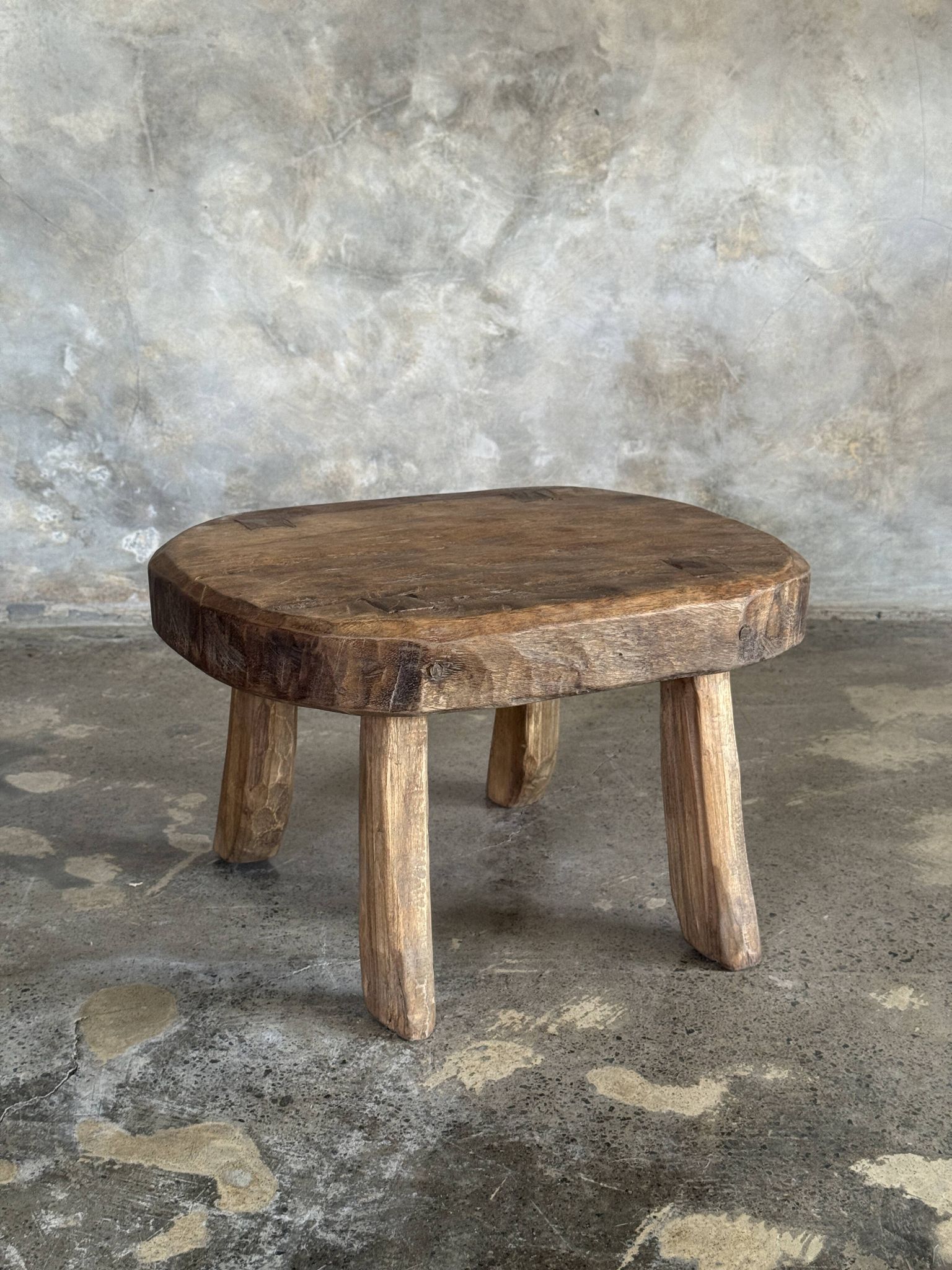 Small stool, oval solid teak accent stool with a two-tone seat.