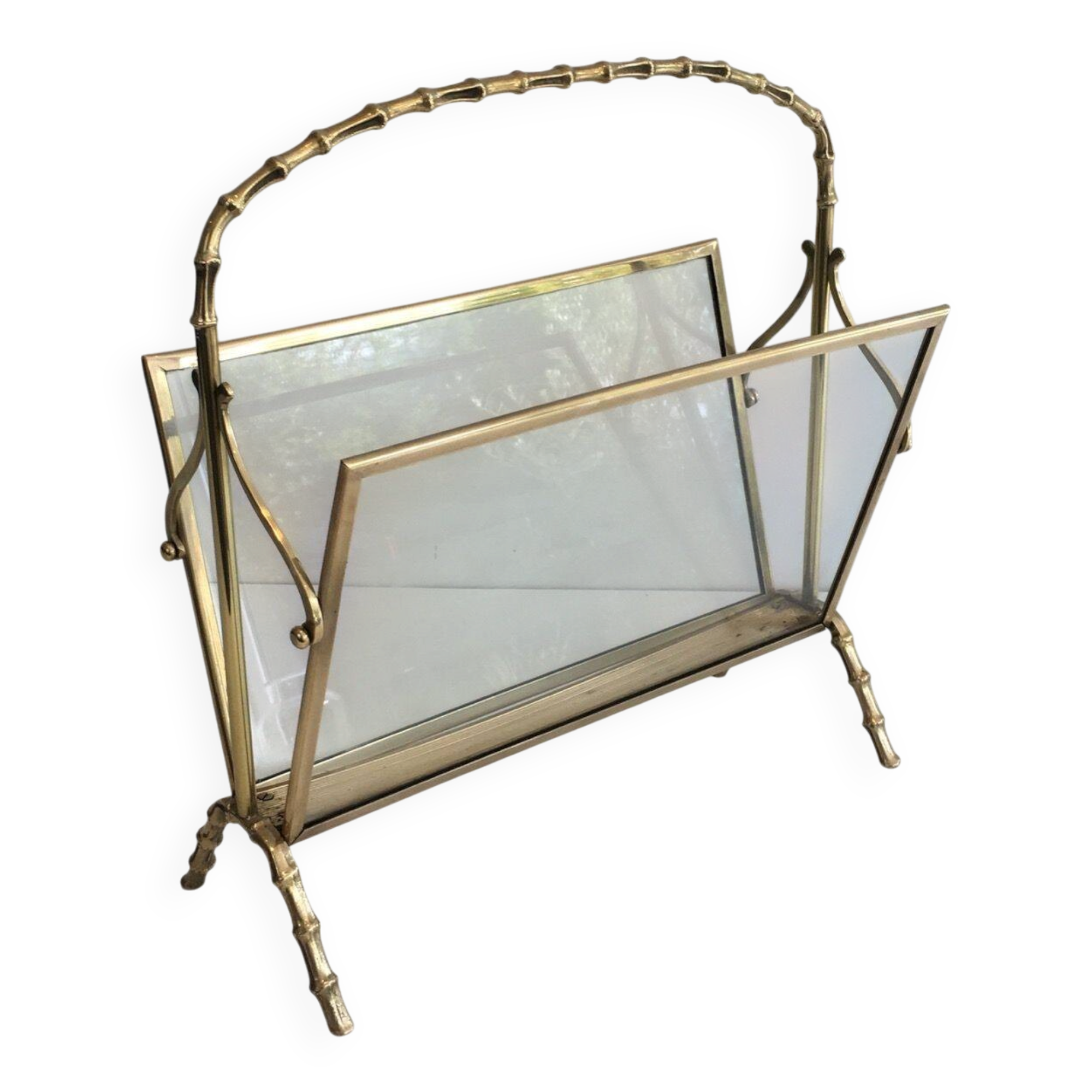 Bamboo-style brass magazine rack from the Baguès house.