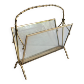 Bamboo-style brass magazine rack from the Baguès house.