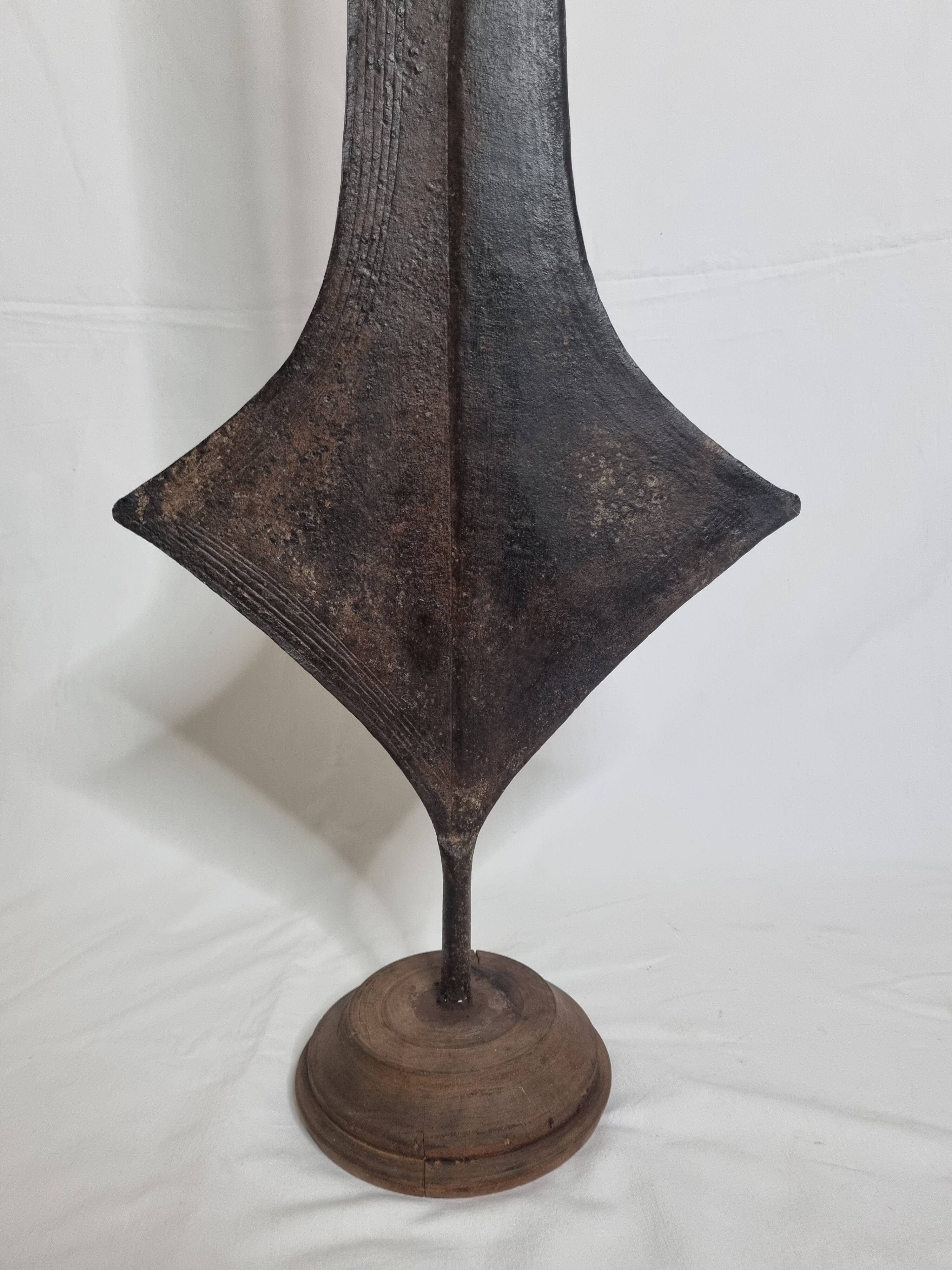 Large Topoké coin, also known as Liganda, wrought iron, sculptural, late 19th century, 160 cm