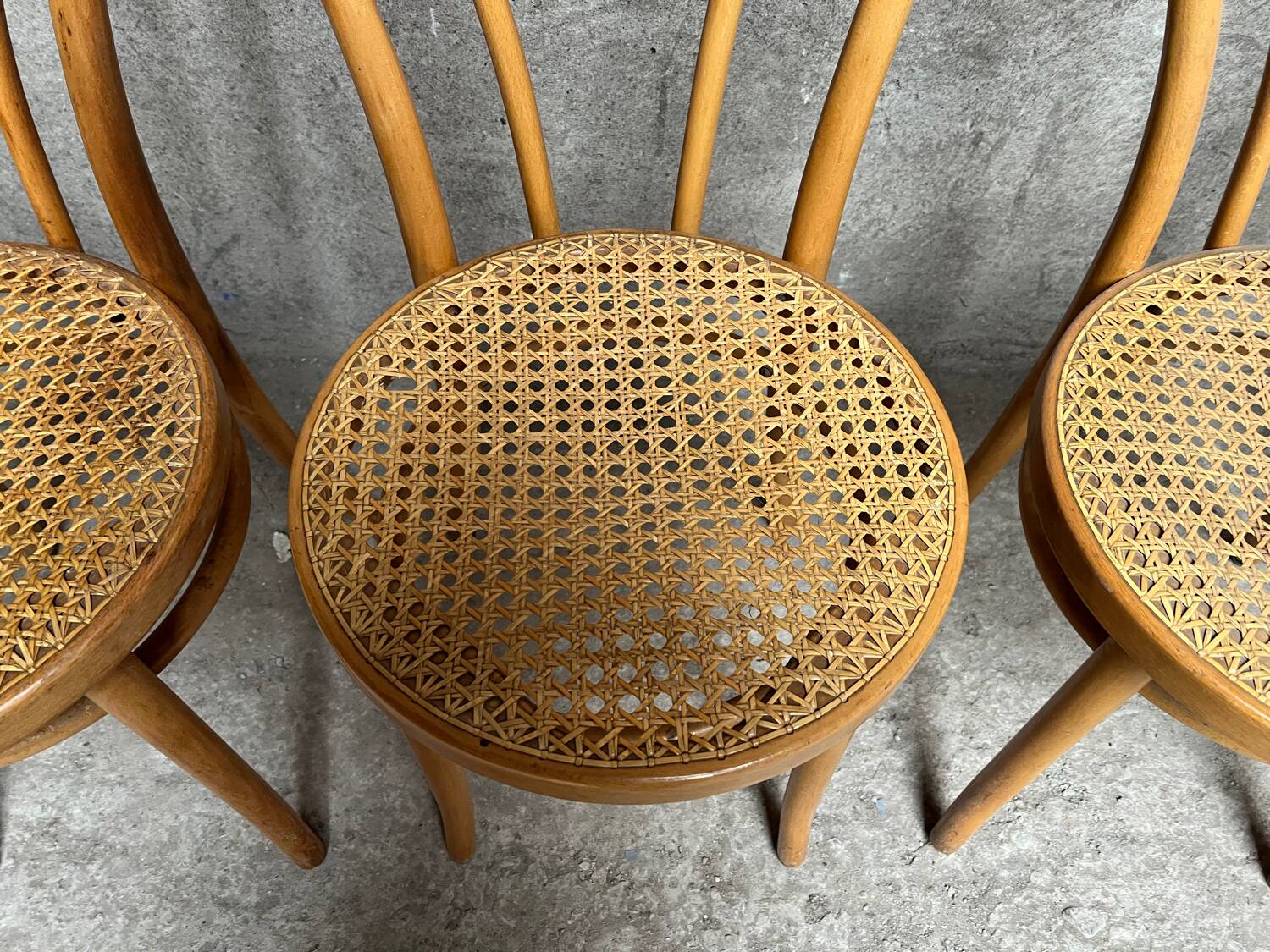 Set of 4 vintage bistro chairs in curved wood and cane seats 1950 1960