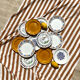 Set of twelve mismatched vintage dessert plates.