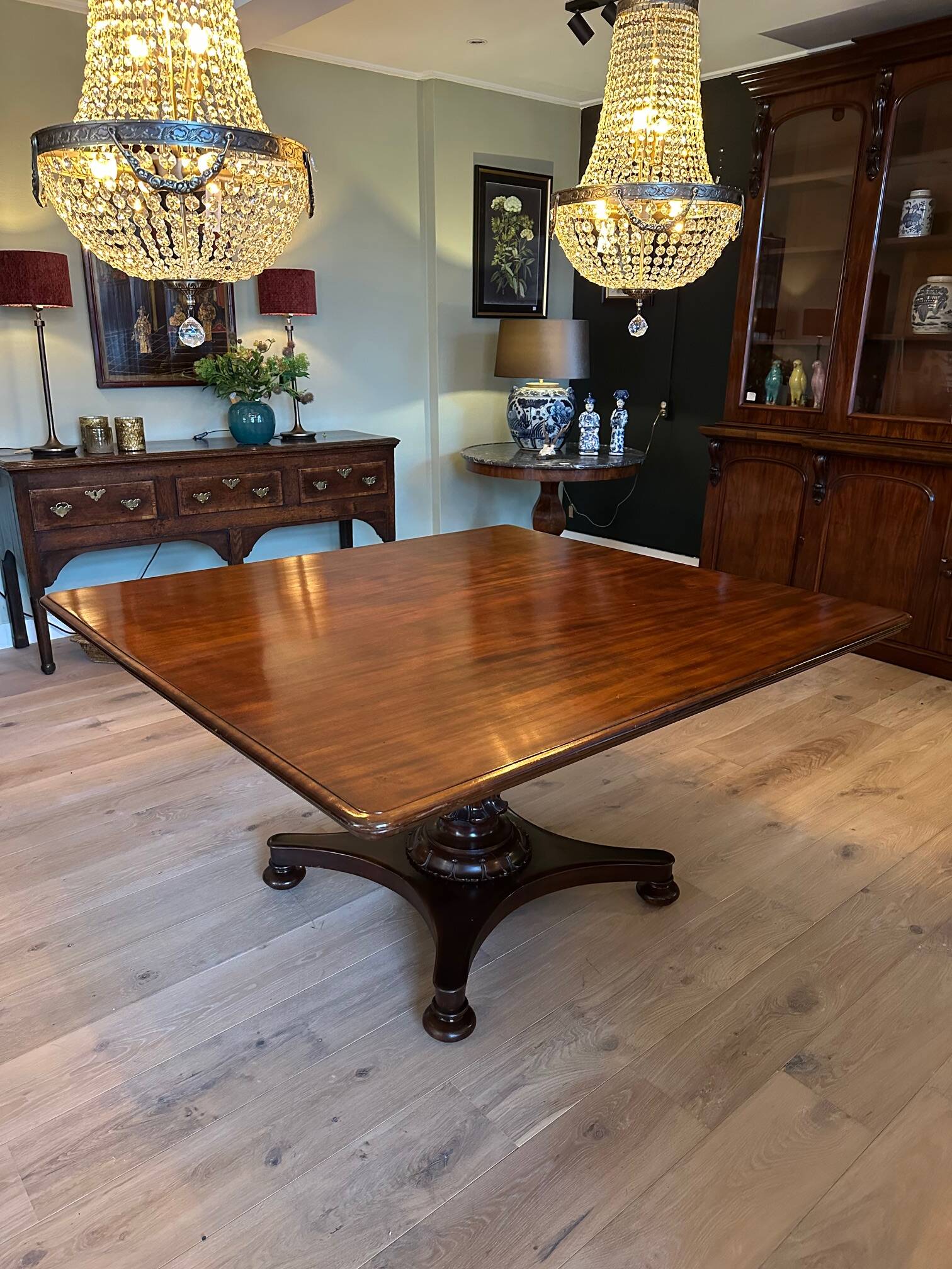 19th century almost square antique mahogany dining table.