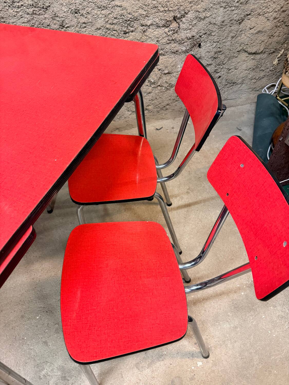 4 red Formica chairs with a 1970s table