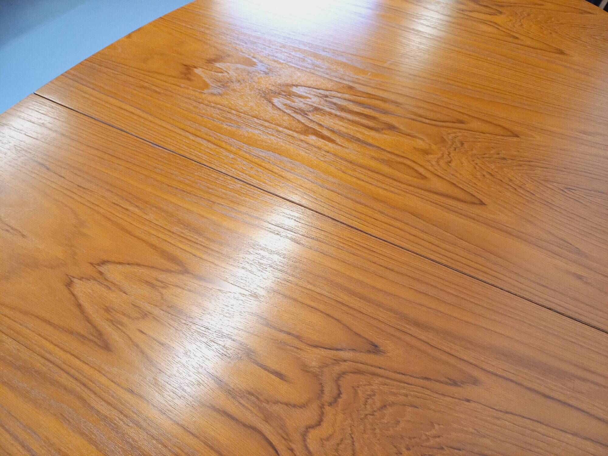 Vintage oval dining table Baumann from the 60s and 70s in teak with extension.