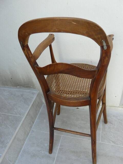 antique caned high chair for children