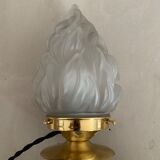 Old laying flame lamp
