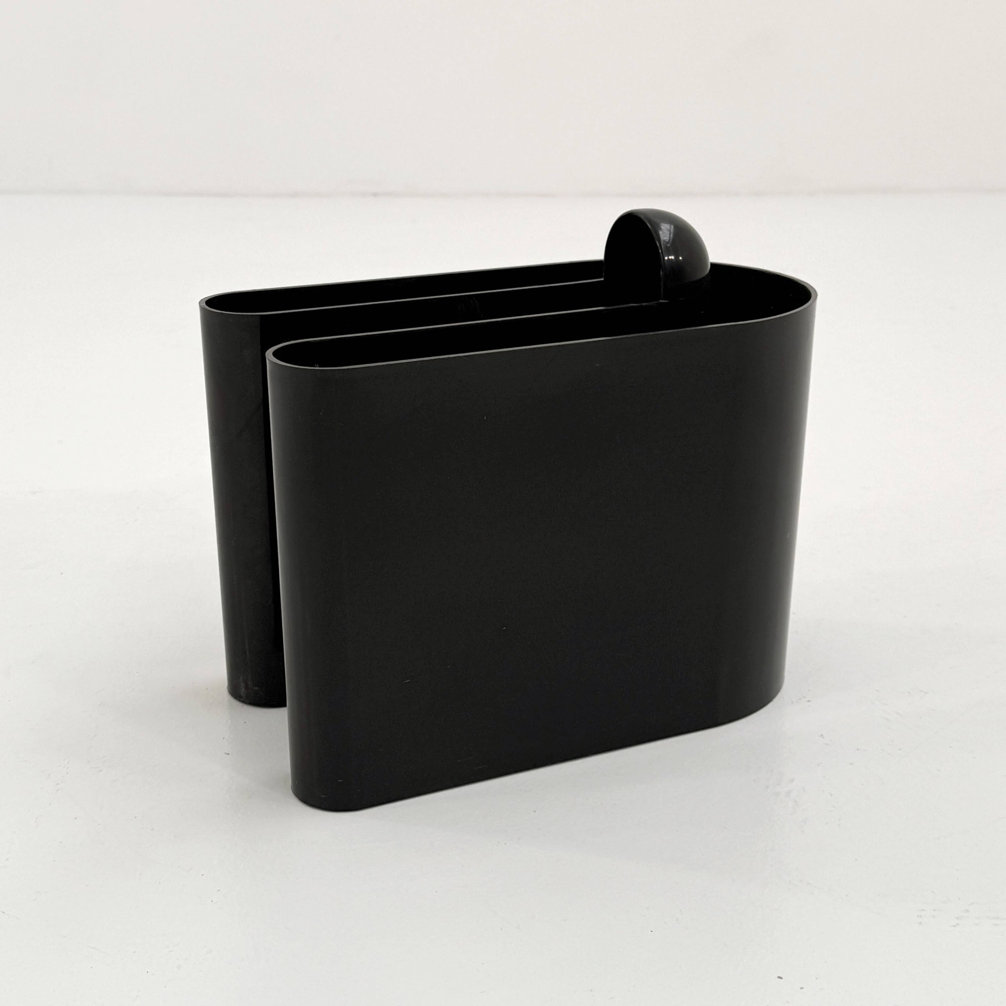 Black magazine rack by Rodolfo Bonetto for Bilumen, 1970