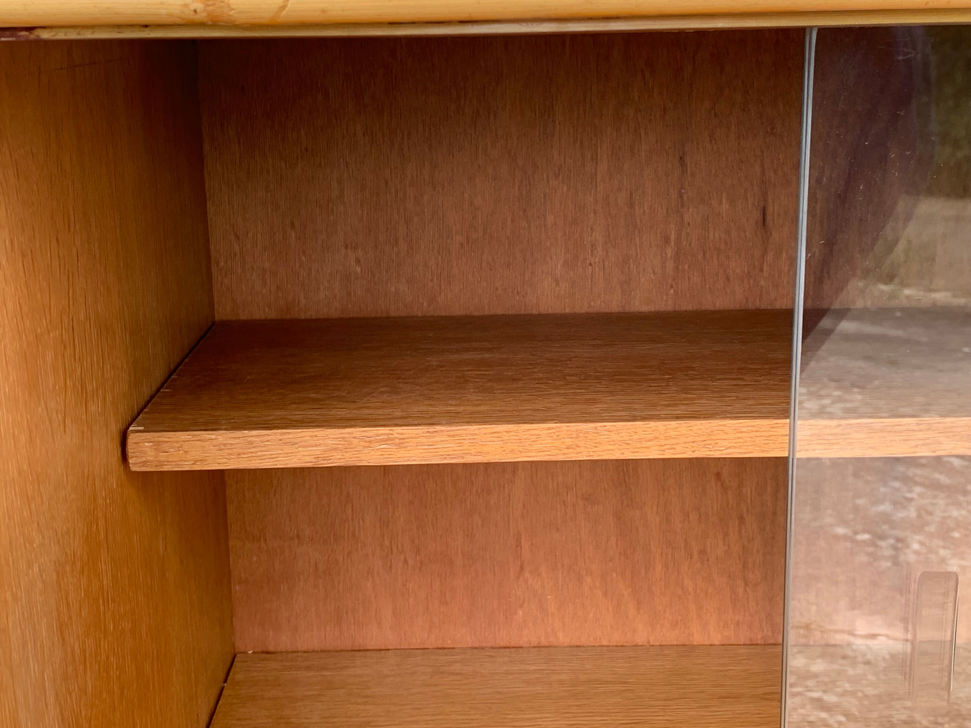 Rattan wardrobe with tapered legs from the 1960s.