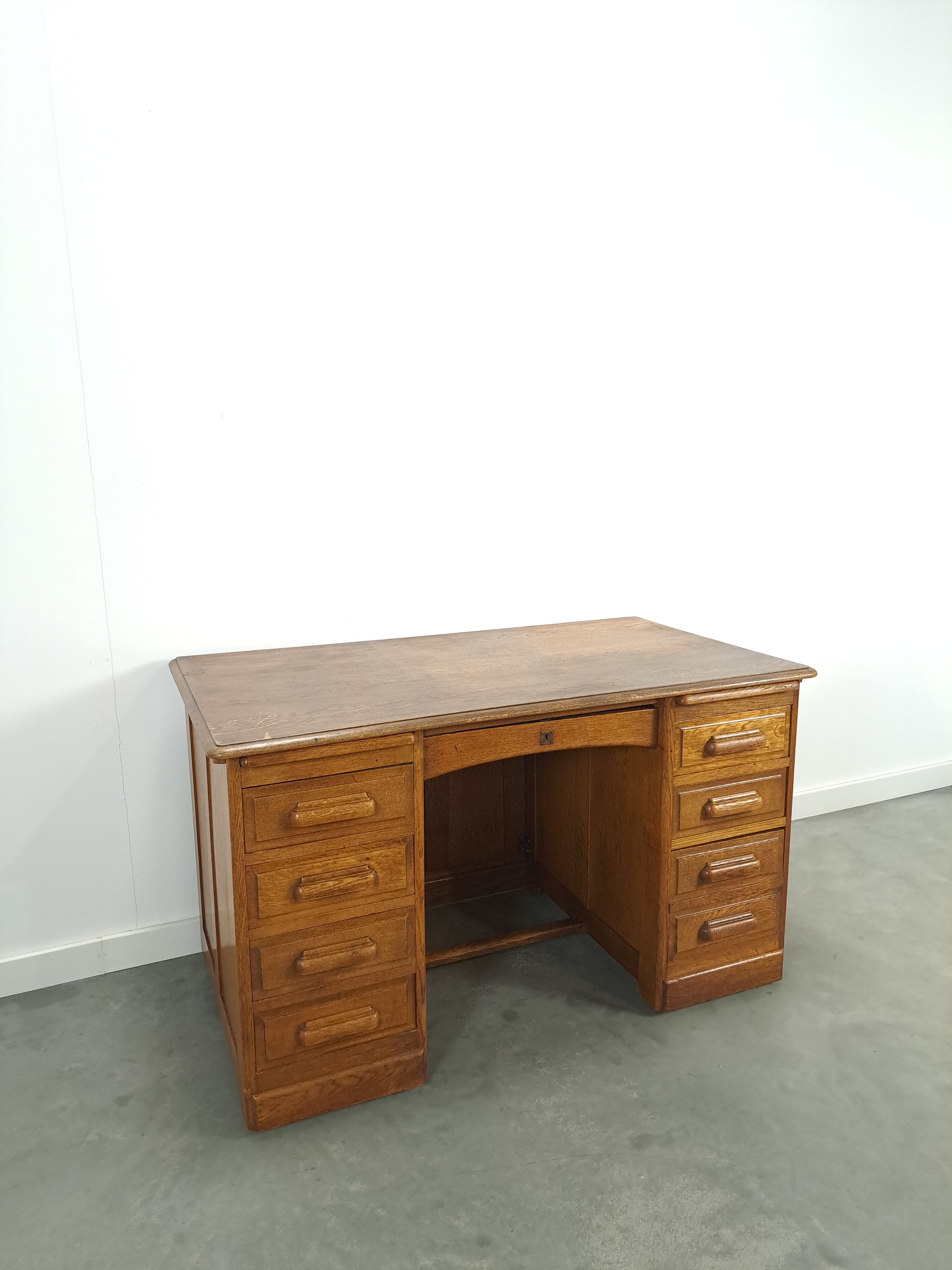 Old oak notary office with drawers, desk