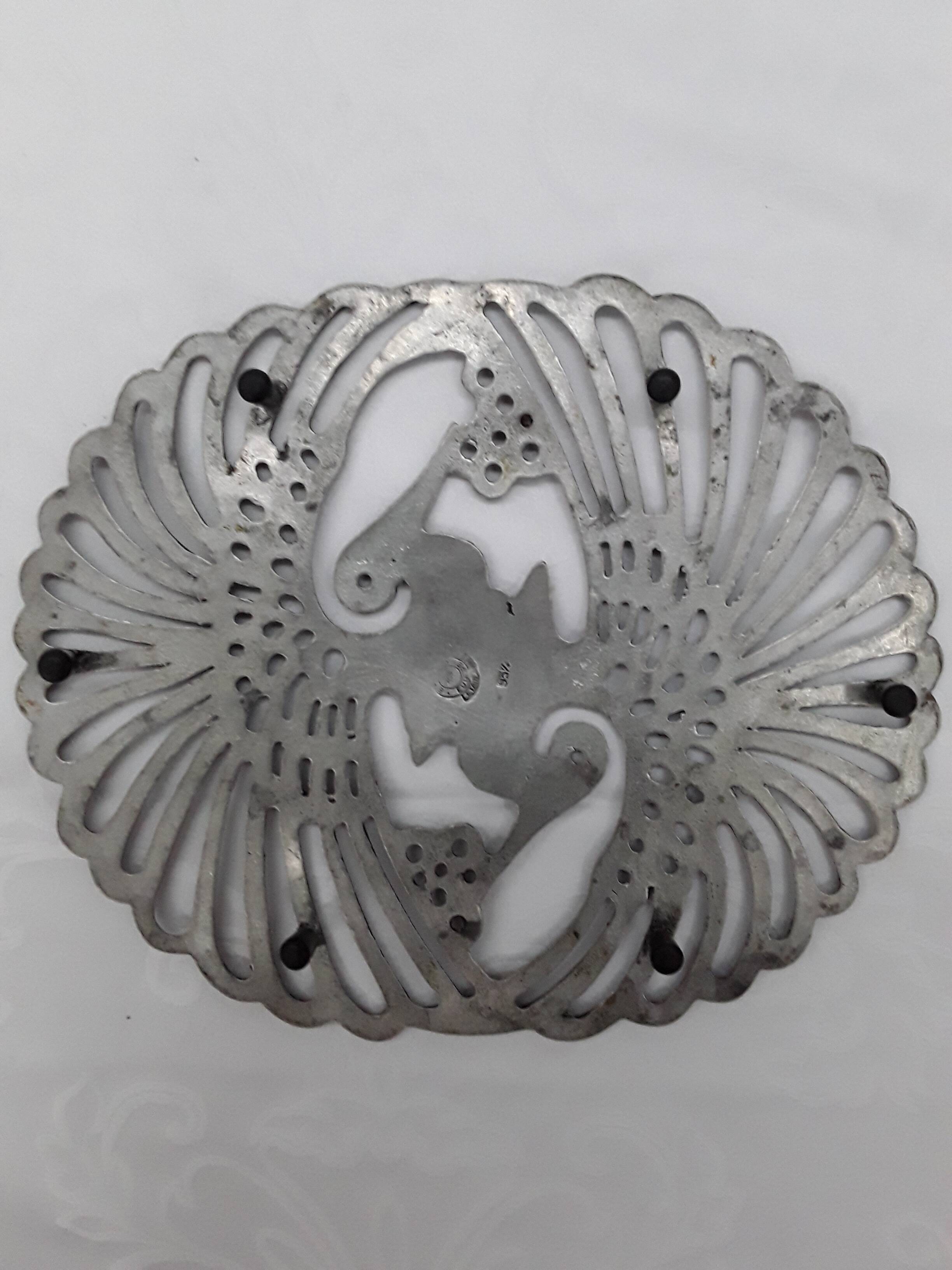 pewter trivet