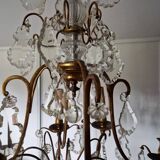 Lustre ancien à 8 bras de lumière à pampilles en bronze et cristal