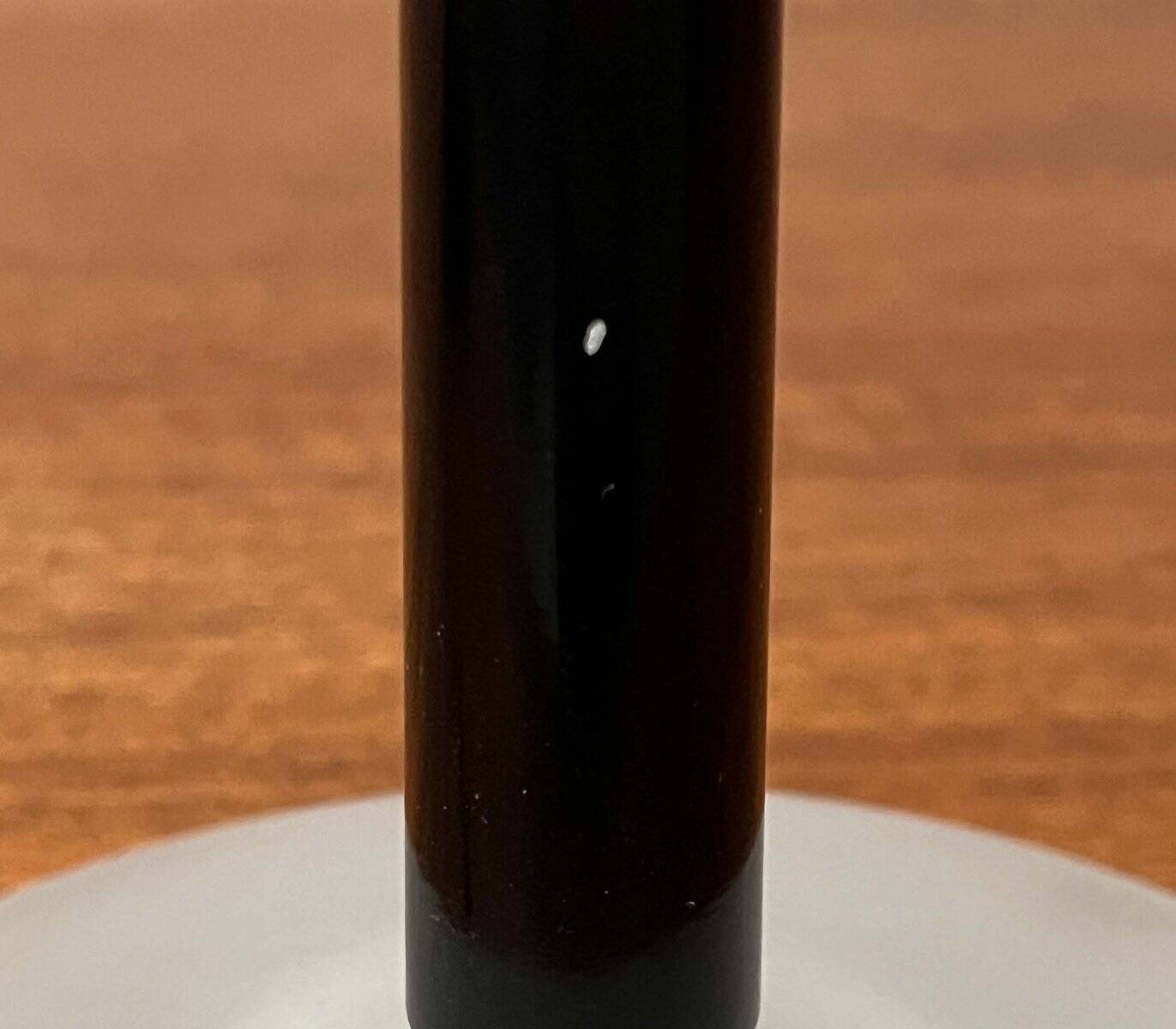 Pao T1 black table lamp, postmodern Italian model by Matteo Thun for Arteluce, 1990s.