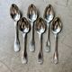 6 large Christofle silver-plated spoons with shell decoration.