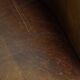 Brown leather club chair