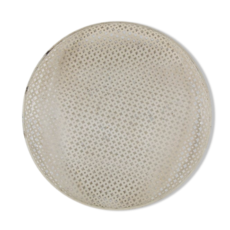Round service tray in perforated metal by Mathieu Matégot