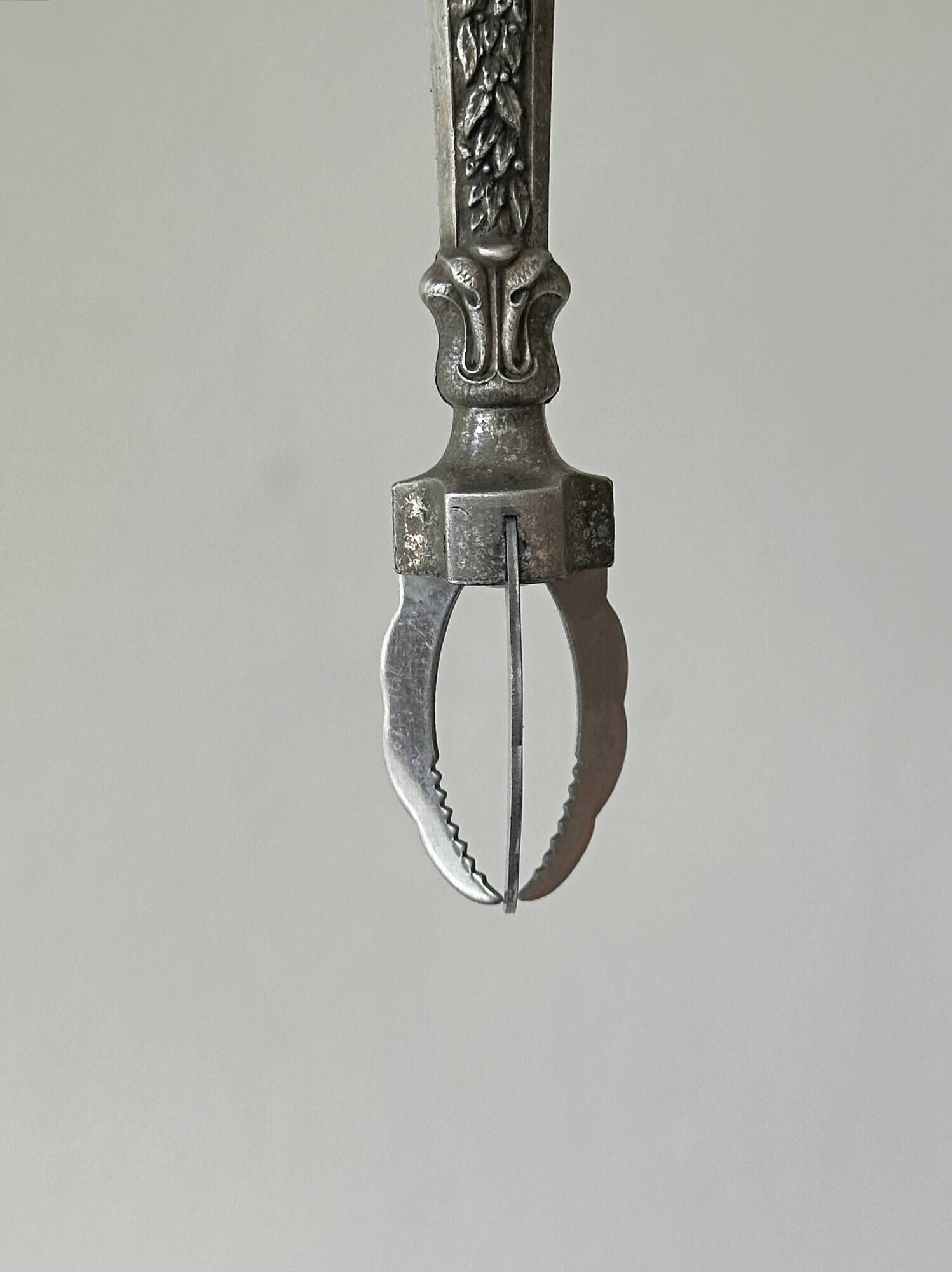 Antique metal sugar tongs