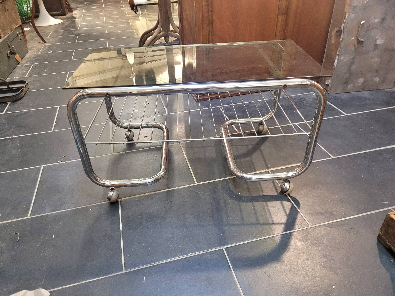 Coffee table with chrome base and smoked glass from the 70s