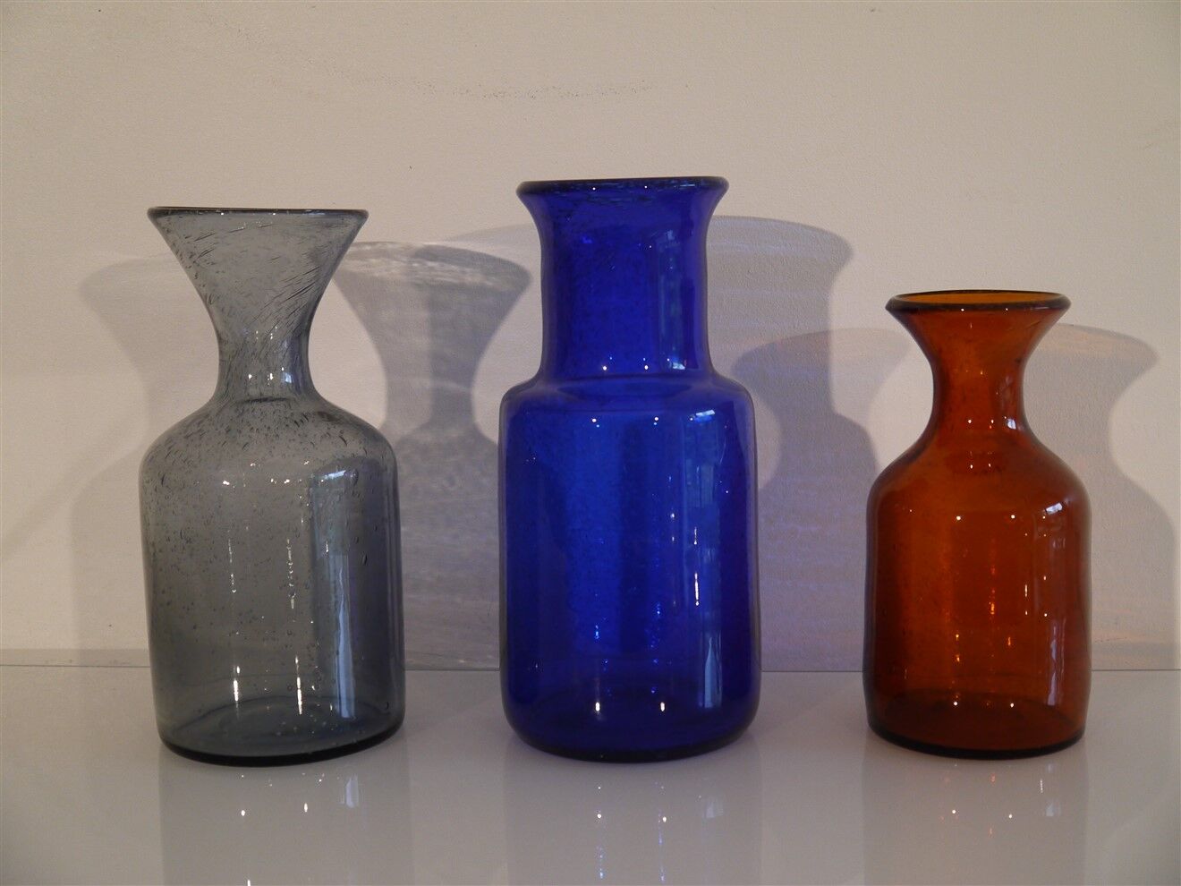 Series of 3 vintage glass vases by Erik Hoglund