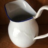 Enamelled plate pitcher