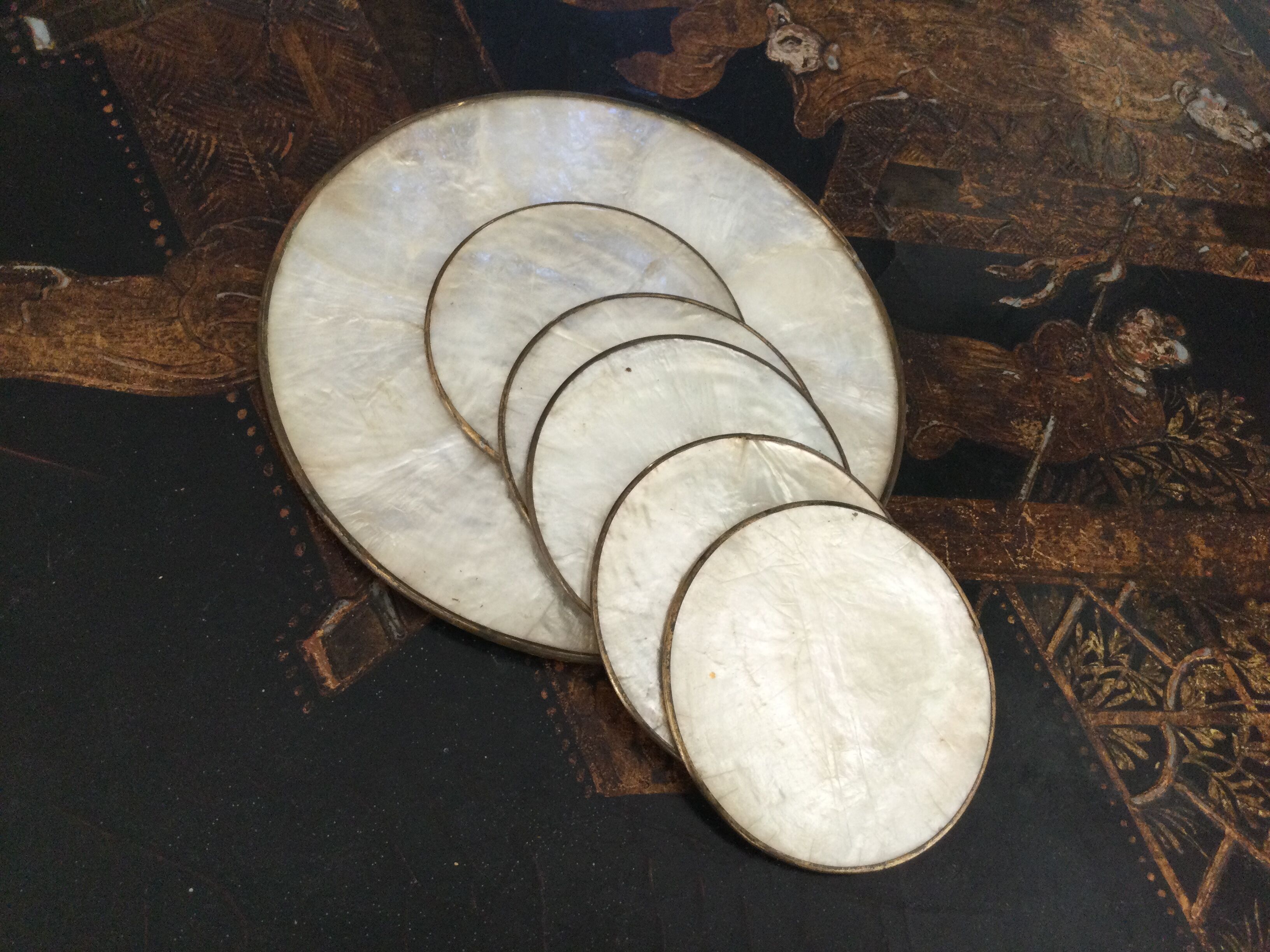 Under vintage glasses in mother-of-pearl