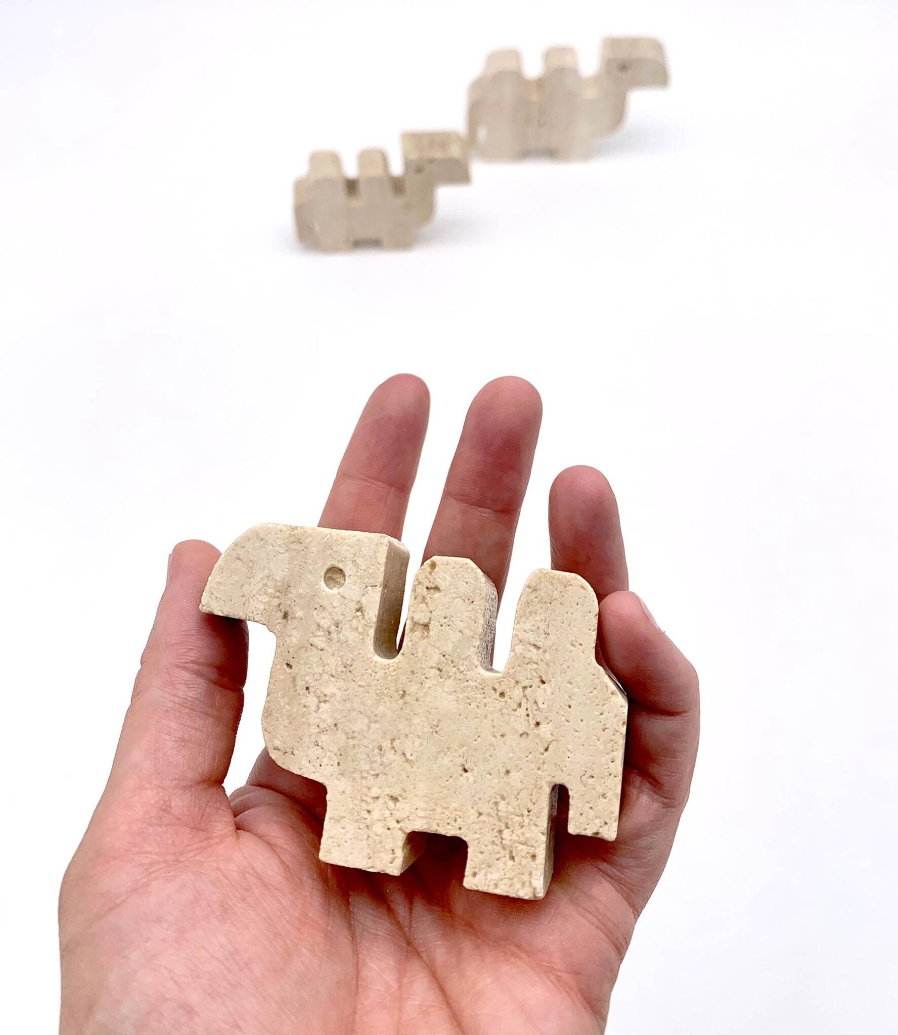 Family of 3 camels in travertine by Fratelli Mannelli