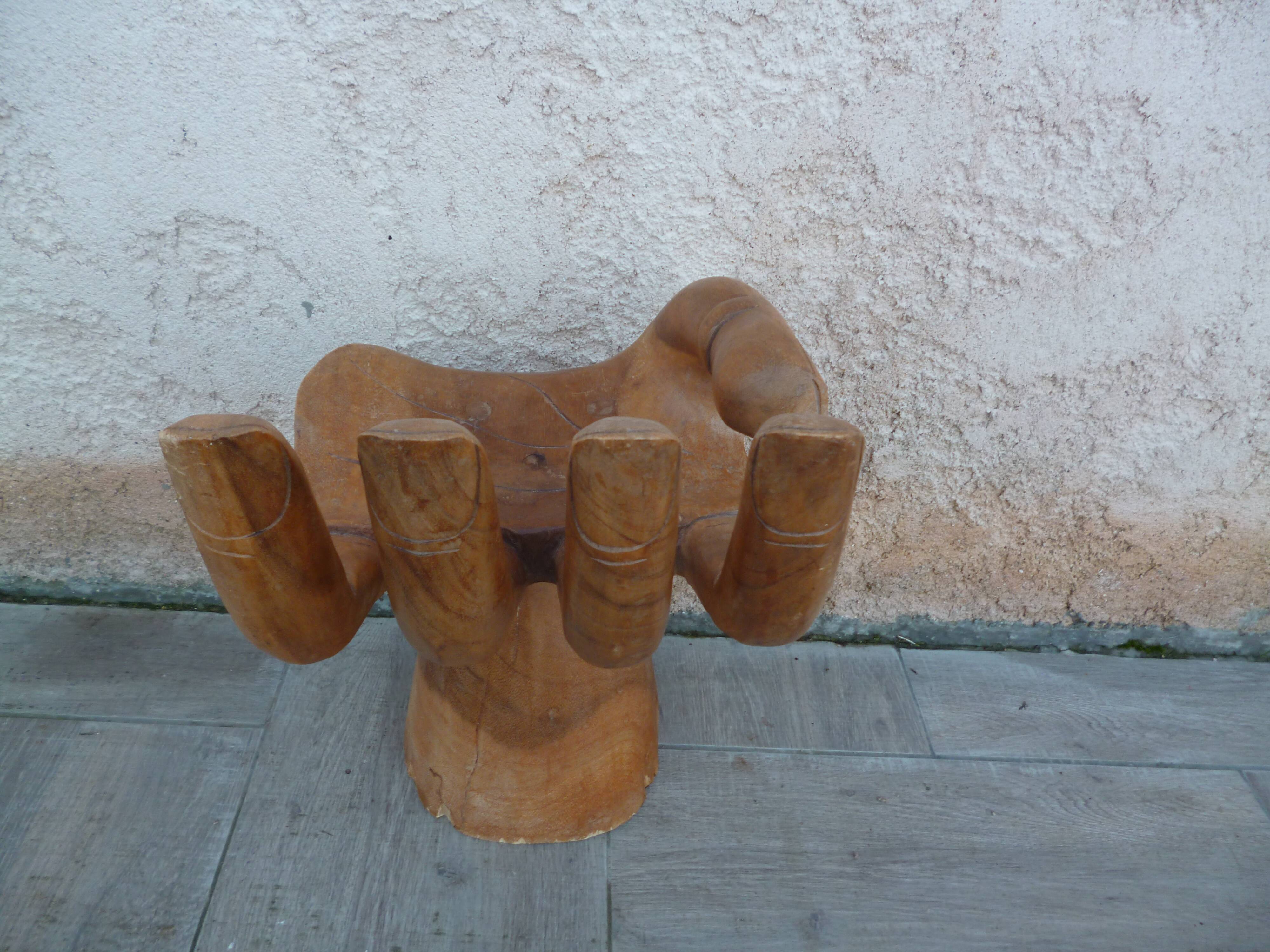 Vintage wooden hand-shaped chair