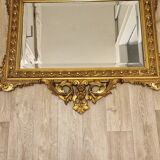 Miroir Napoléon III en stuc doré