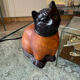 Art Deco cat lamp in glass paste, signed.