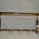 Chrome iron coat rack with hat holder
