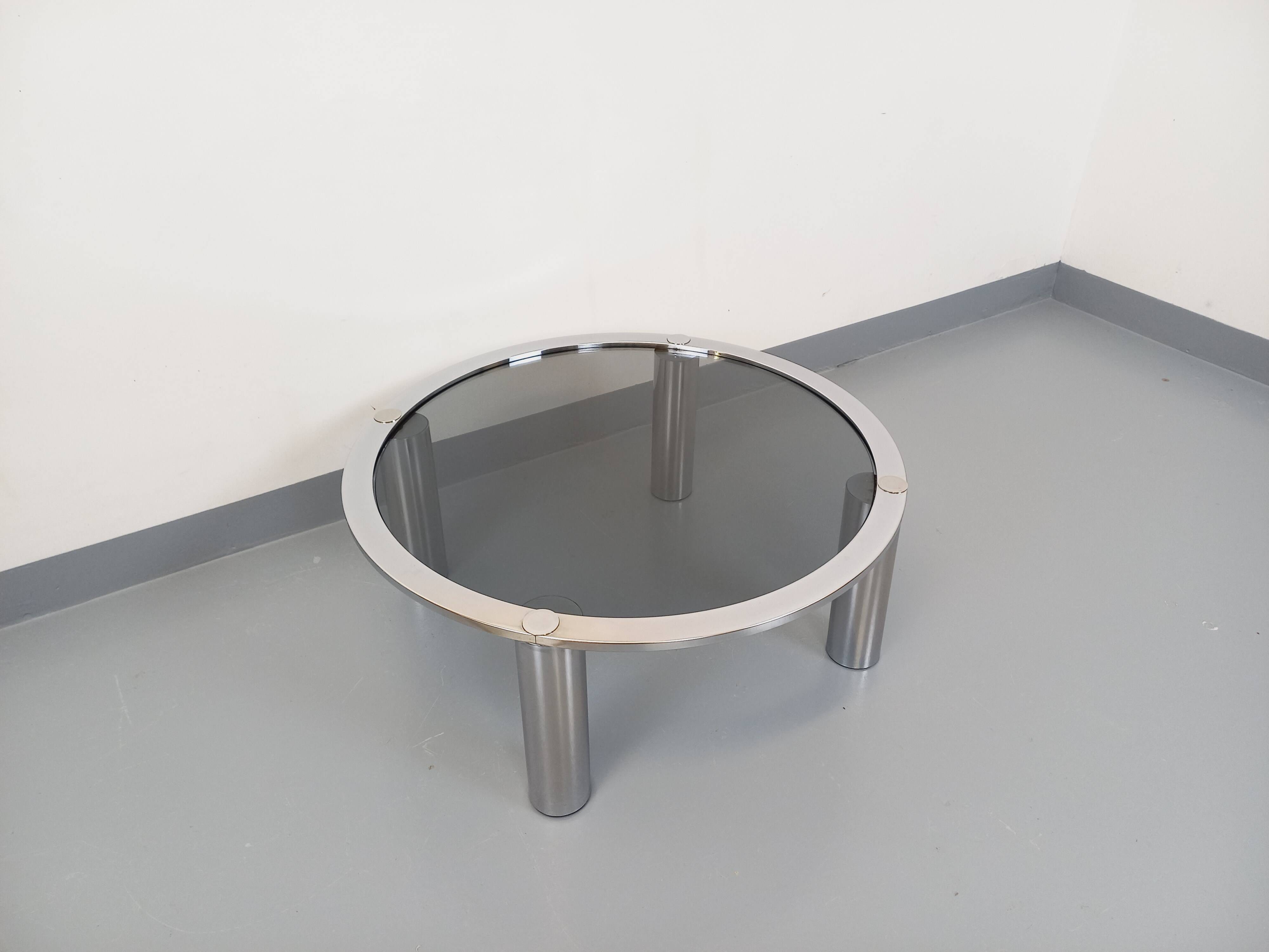 Vintage round coffee table in smoked glass and chrome metal from the 70s