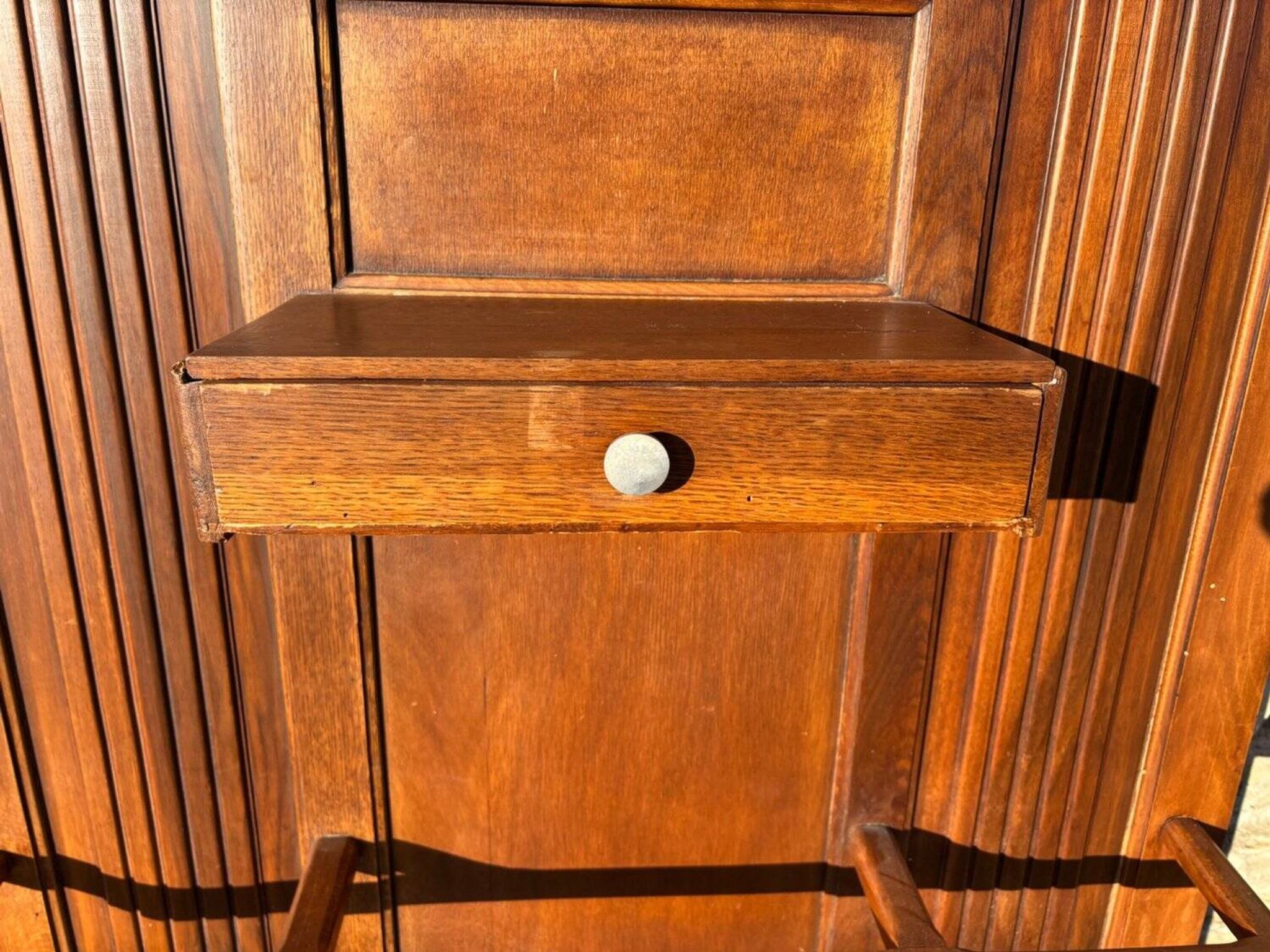 Art Deco wardrobe in carved solid oak with bevelled mirror, 1930.
