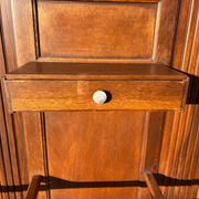 Art Deco wardrobe in carved solid oak with bevelled mirror, 1930.
